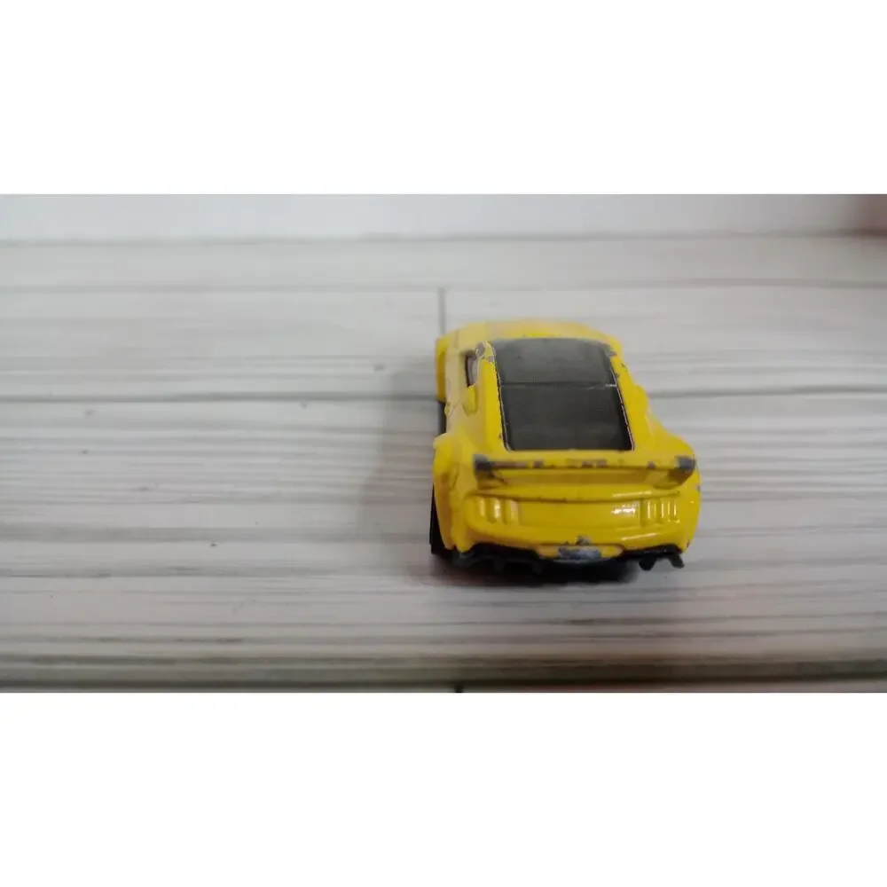 HOT WHEELS CUSTOM 2015 FORD MUSTANG YELLOW PENNZOIL